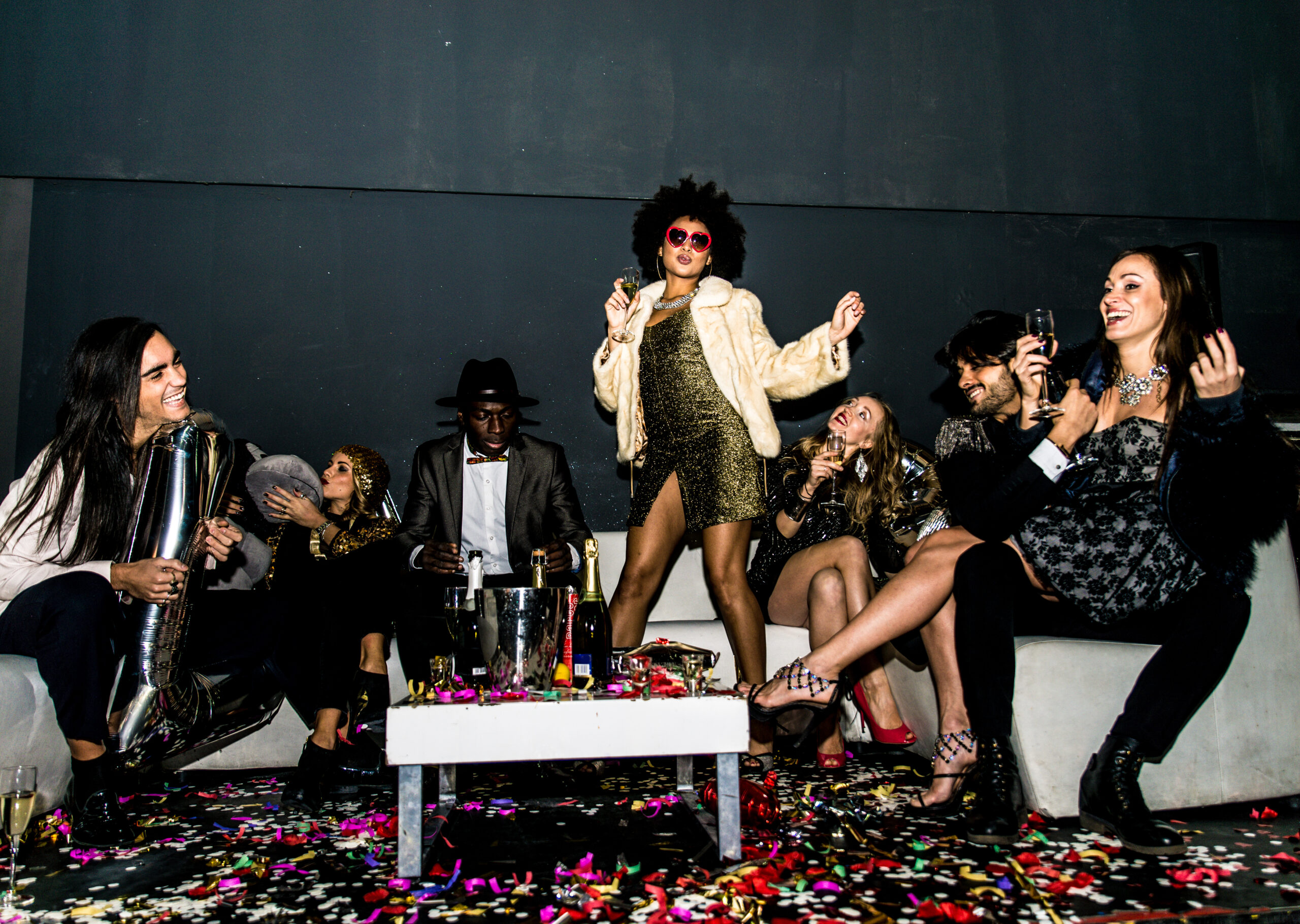 Multi-ethnic group of friends celebrating in a nightclub - Clubbers having party